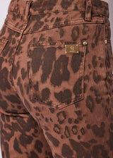 Pantaloni da donna con bottoni dorati