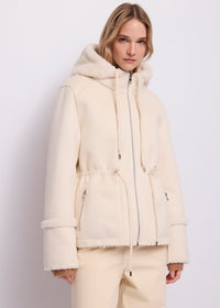 Giacca da donna in shearling con cappuccio
