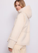 Giacca da donna in shearling con cappuccio