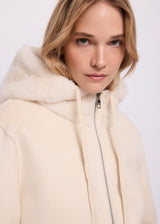 Giacca da donna in shearling con cappuccio