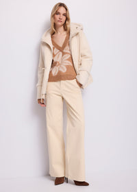 Giacca da donna in shearling con cappuccio