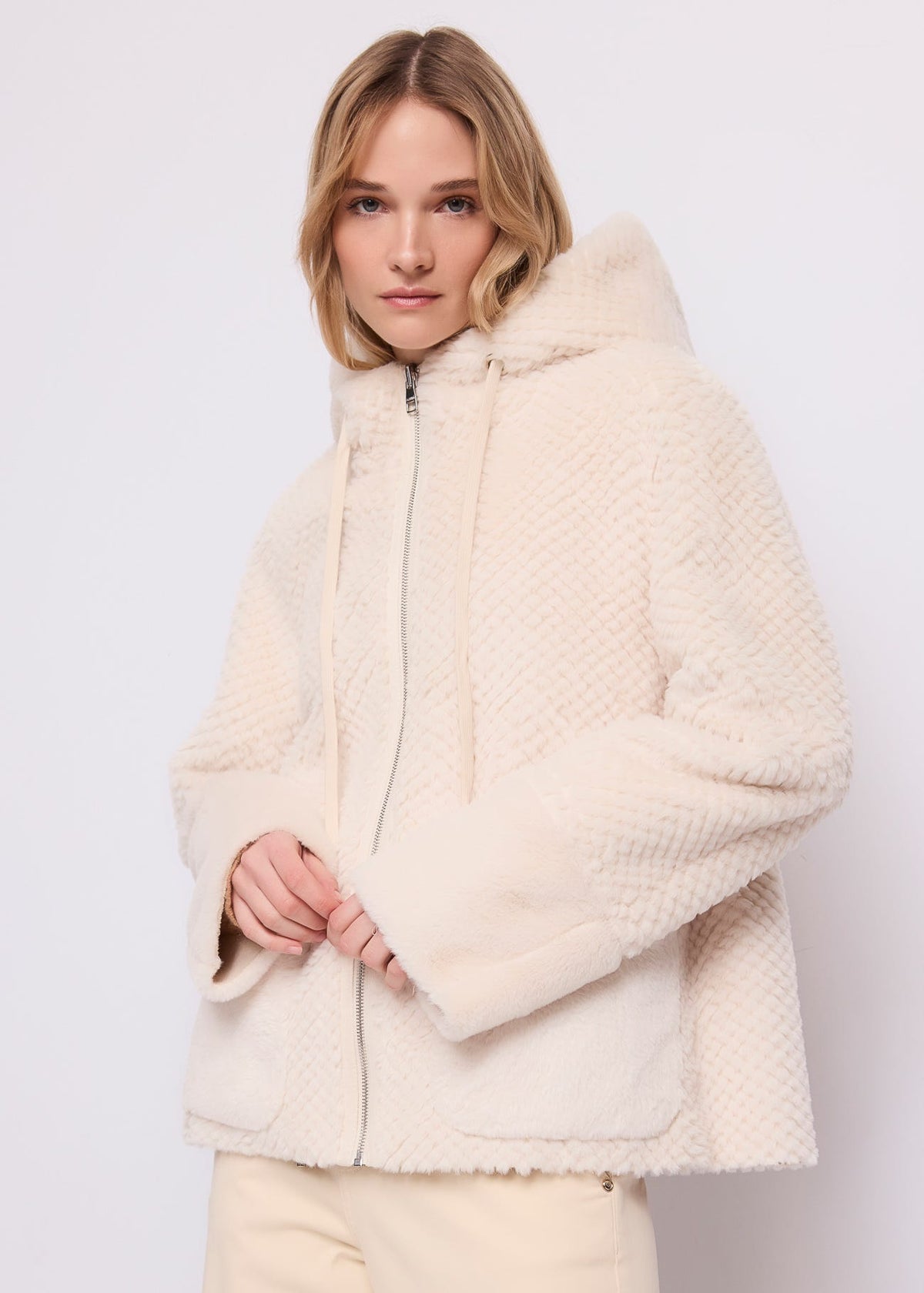 Giacca da donna in shearling con cappuccio